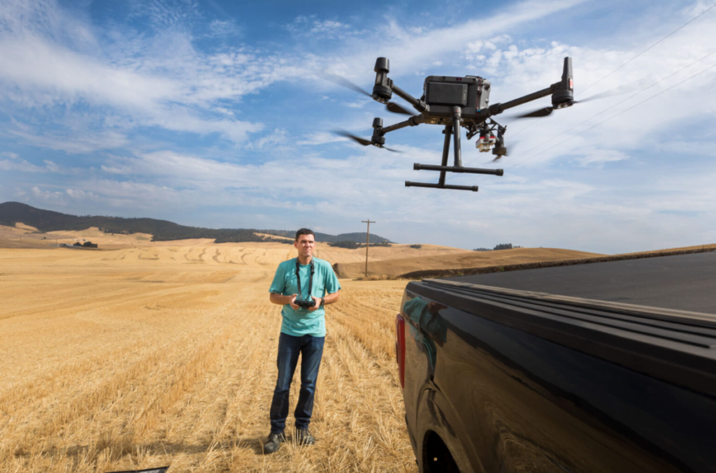 A man using a drone.