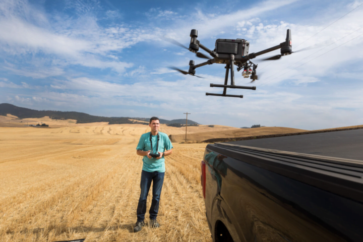 A man using a drone.